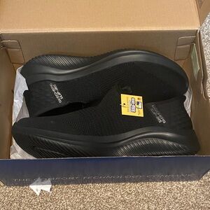 Skechers Women’s Black Slip-On Knit Sneakers